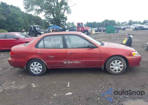 2002 Toyota Corolla Le z USA, uszkodzony, nr VIN 2T1BR12E22C530248